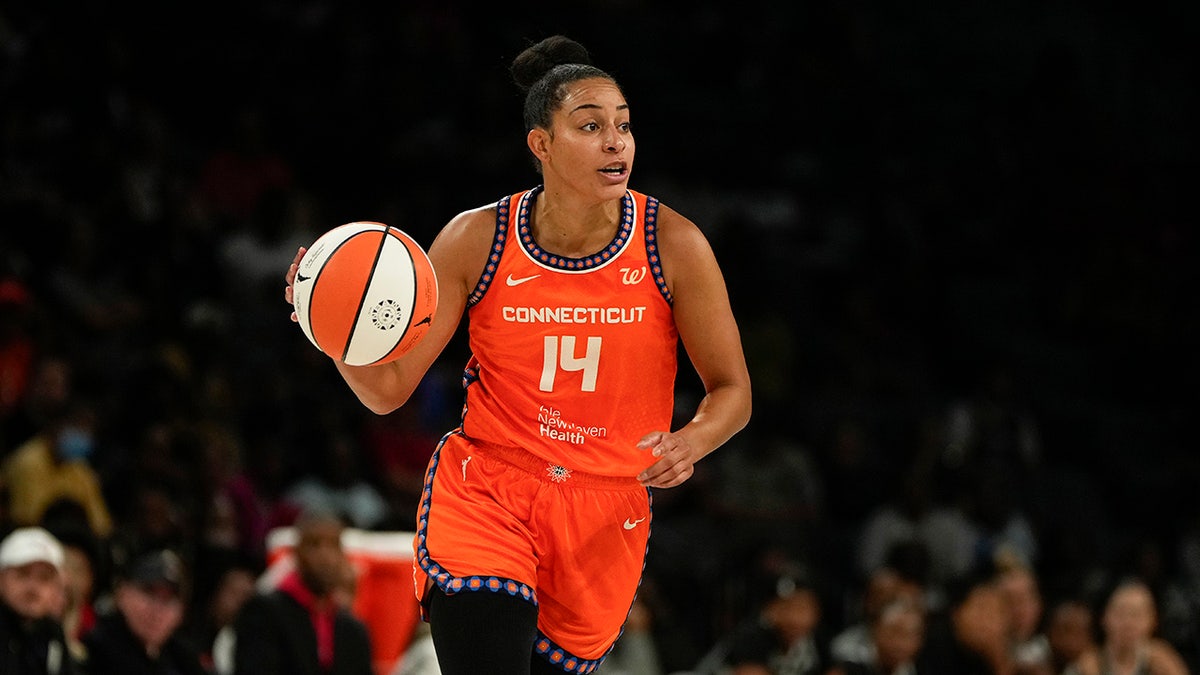 Connecticut Sun guard Bria Hartley dribbles