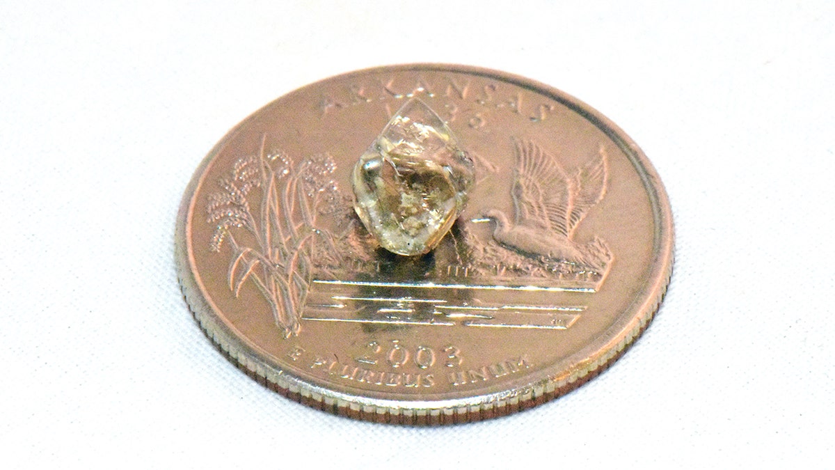 A New York woman recently discovered a 2.3-carat white diamond at an Arkansas state park while searching for one to place in her engagement ring.