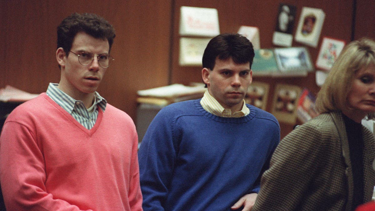 Erik Menendez (L) and his brother Lyle (R) listen during a pre-trial hearing