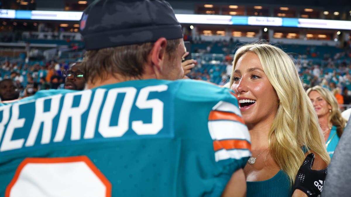 Braxton Berrios and Alix Earl at an NFL game