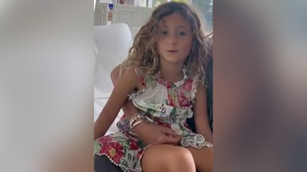 Mila Yankelevich in a dress