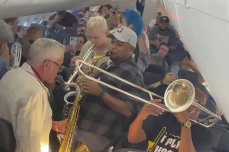 Passengers stuck on a delayed flight to Seattle get an unexpected concert from jazz band