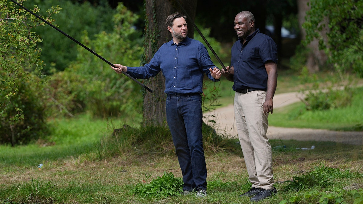 JD Vance talking to David Lammey during a fishing outing