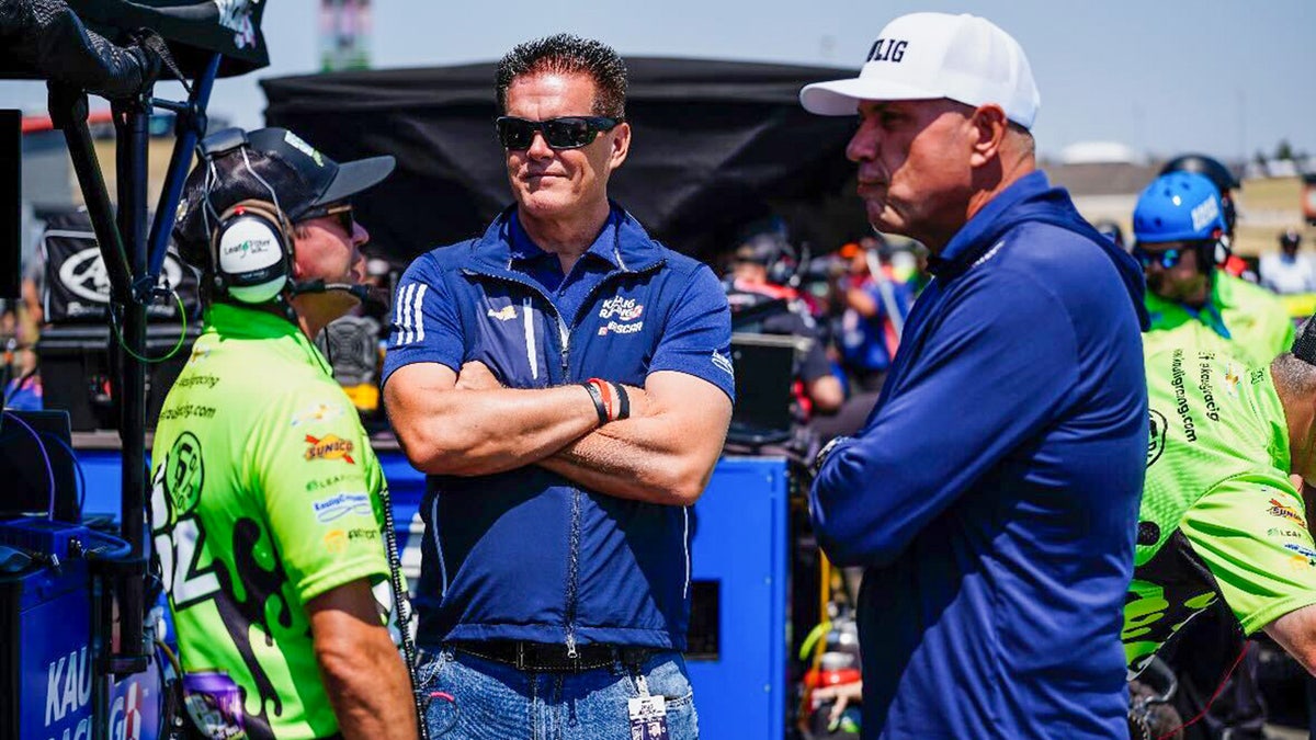 Matt Kaulig and Chris Rice in pit row