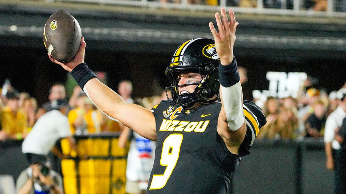 Missouri quarterback Beau Pribula celebrates