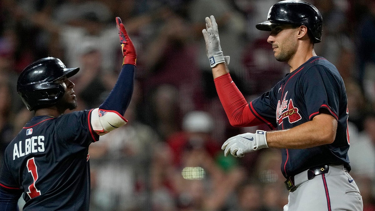 Matt Olson and Ozzie Albies celebrate