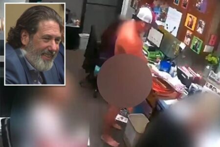 Paraphiliac doctor loses his license after being caught on tape stalking through office naked, performing sex act on employee
