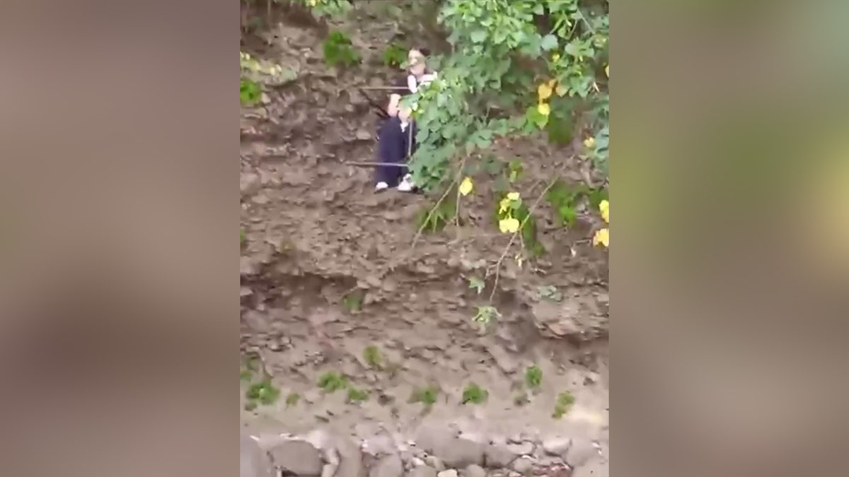 person stranded in field