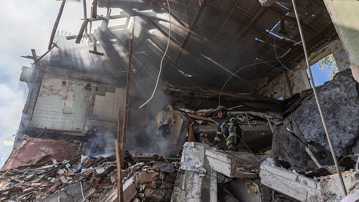 Ukrainian firefighters search for survivors