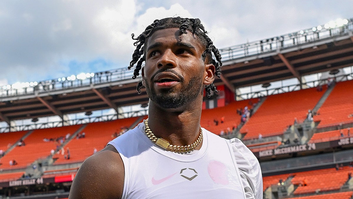 Shedeur Sanders looks on field after game