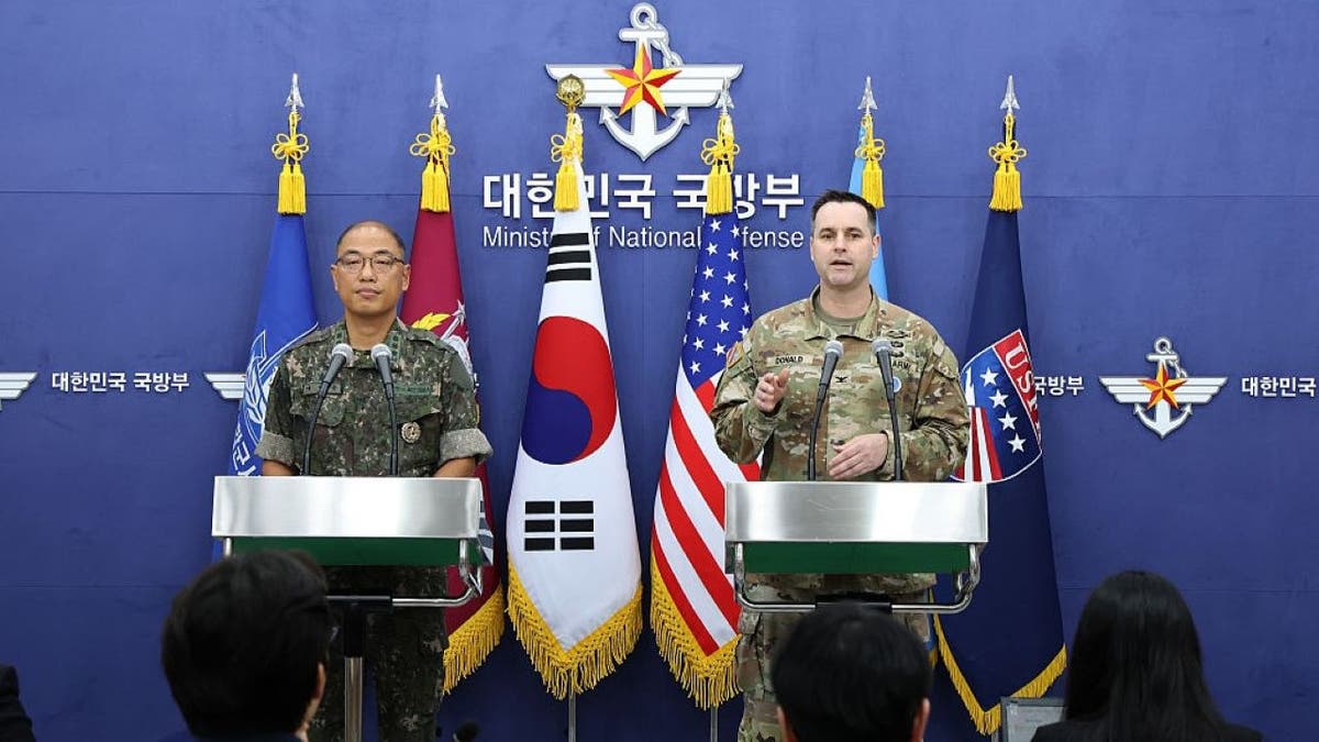 Col. Lee Sung-jun, left, public affairs director of South Korea's Joint Chiefs of Staff and Col. Ryan Donald, right, public affairs director of the United Nations Command (UNC), attend the press briefing for the Ulchi Freedom Shield 2025 exercise at the Defense Ministry on Aug. 7, 2025 in Seoul, South Korea.