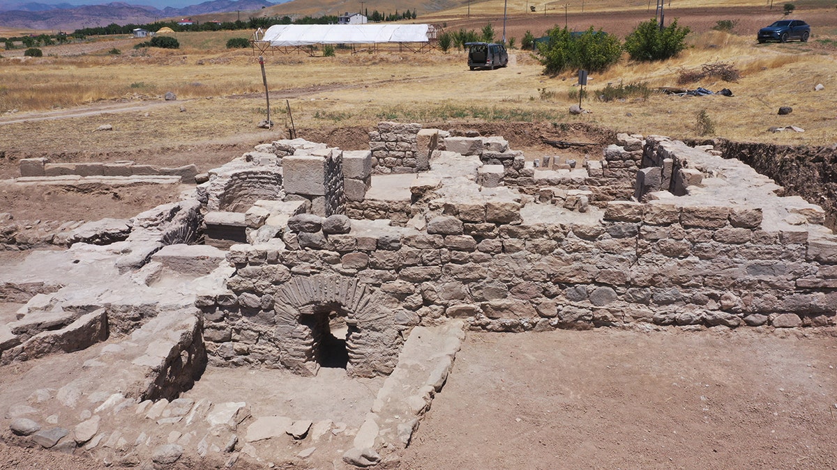 Stone-built structure of bathhouse in excavation area