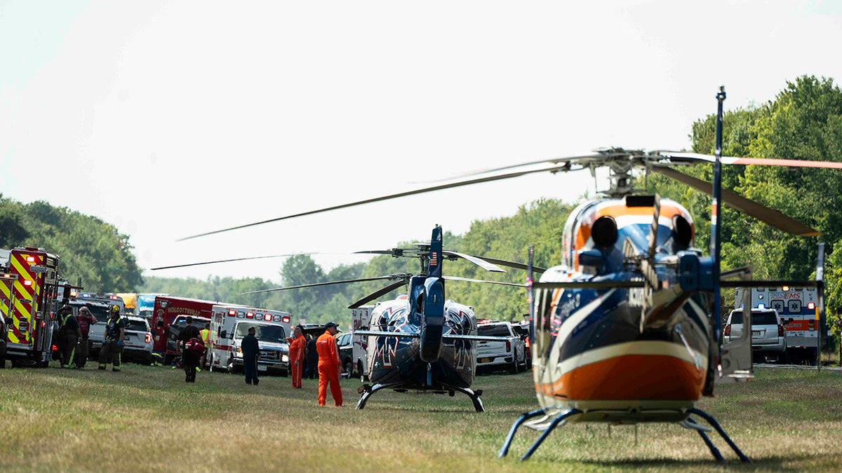 Authorities respond to a tour bus crash on the eastbound I-90 near Pembroke, N.Y., Friday, Aug. 22, 2025.