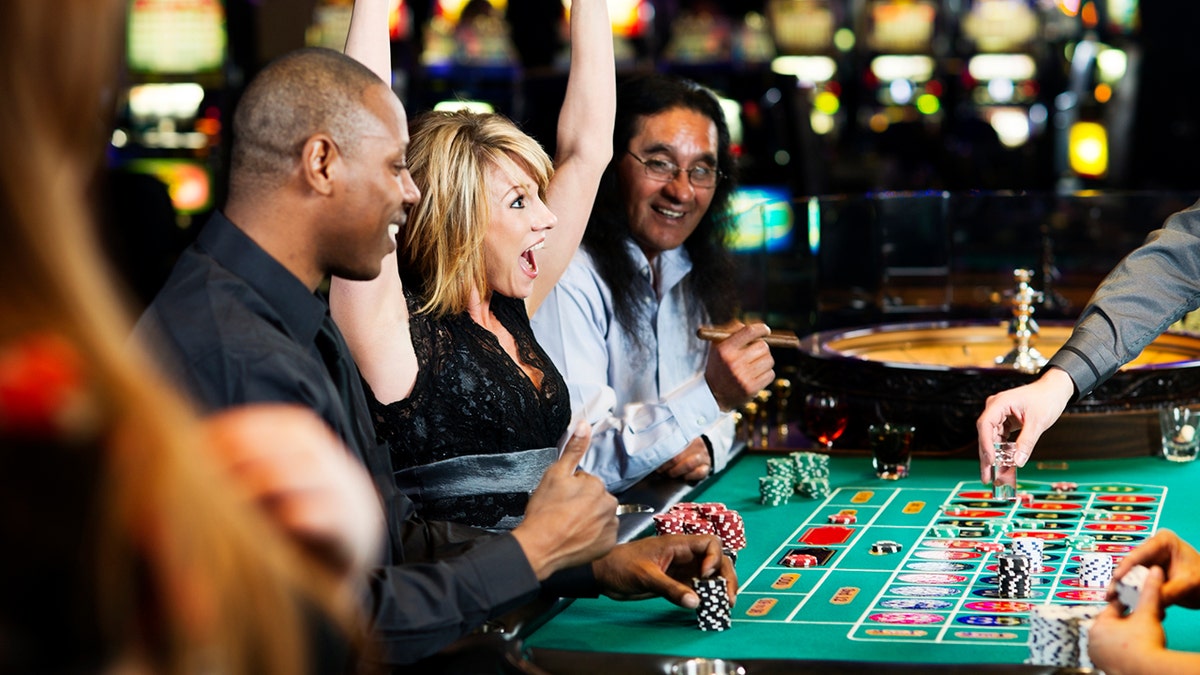 woman celebrating casino win