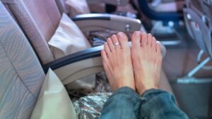 Flight passenger gets too comfortable on plane, sparking etiquette debate