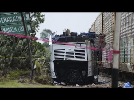 Train-bus collision near Mexican capital leaves 10 dead and 55 injured