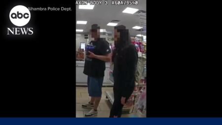 Domestic violence suspect arrested after woman asks for help with hand signal