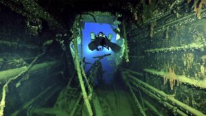 Eerie images show century-old wreck of Titanic’s sister ship as divers recover artifacts for first time
