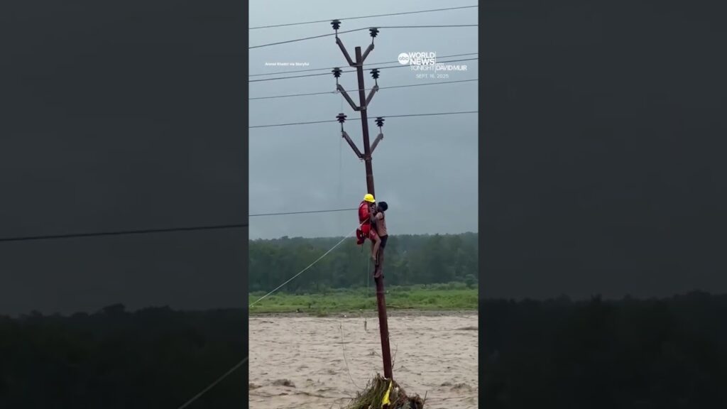 Man saved after clinging to pole for hours amid flooding in India