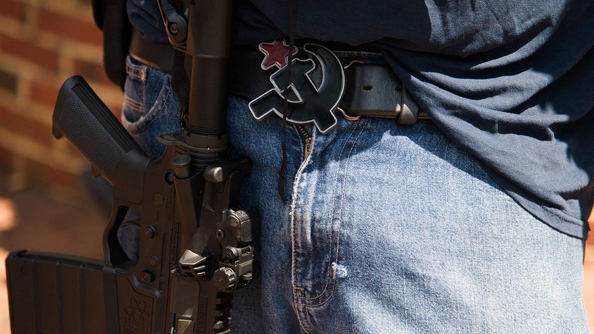 A member of a leftist pro-gun group called Redneck Revolt openly carries his firearm in Charlottesville, VA on Saturday August 12th.