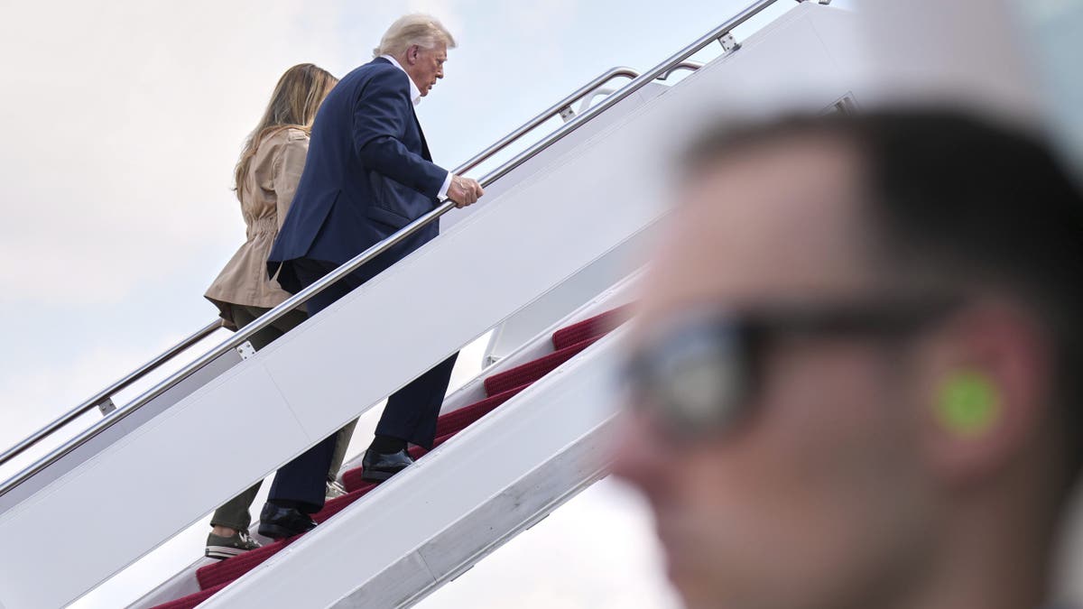 President Donald Trump and first lady Melania Trump board Air Force One July 11, 2025, at Joint Base Andrews, Maryland, en route to Texas. (The Associated Press)