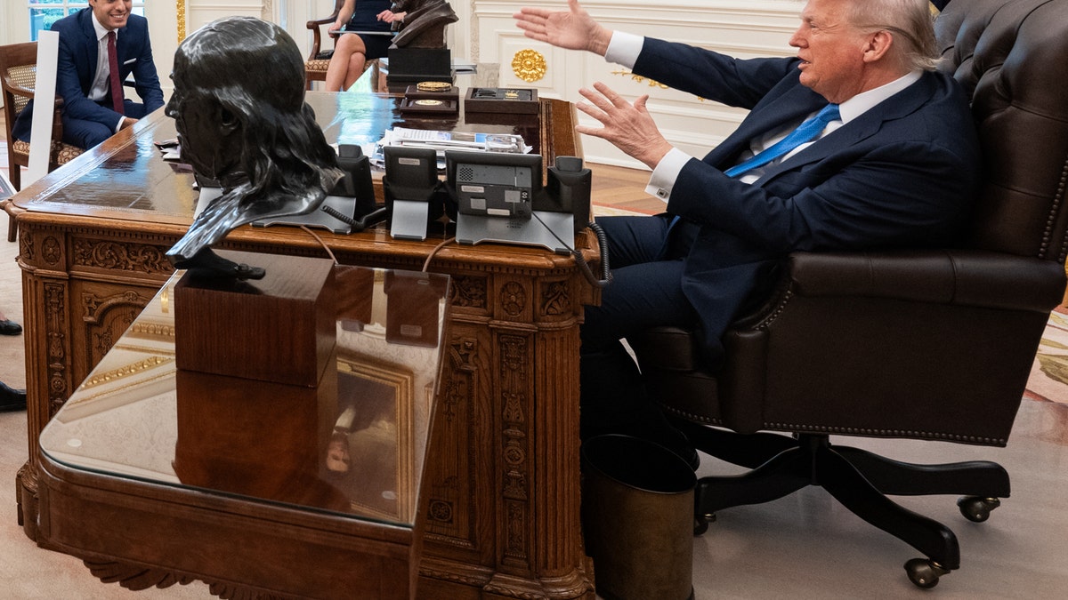 President Donald Trump meets with White House staff and America250 executive director Ariel Abergel, left, in the Oval Office to discuss the 250th Anniversary of the U.S. Army Grand Military Parade, June 3, 2025.
