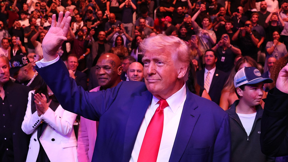 Trump waving