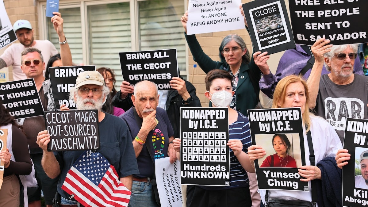 Protesters oppose President Donald Trump's deportations