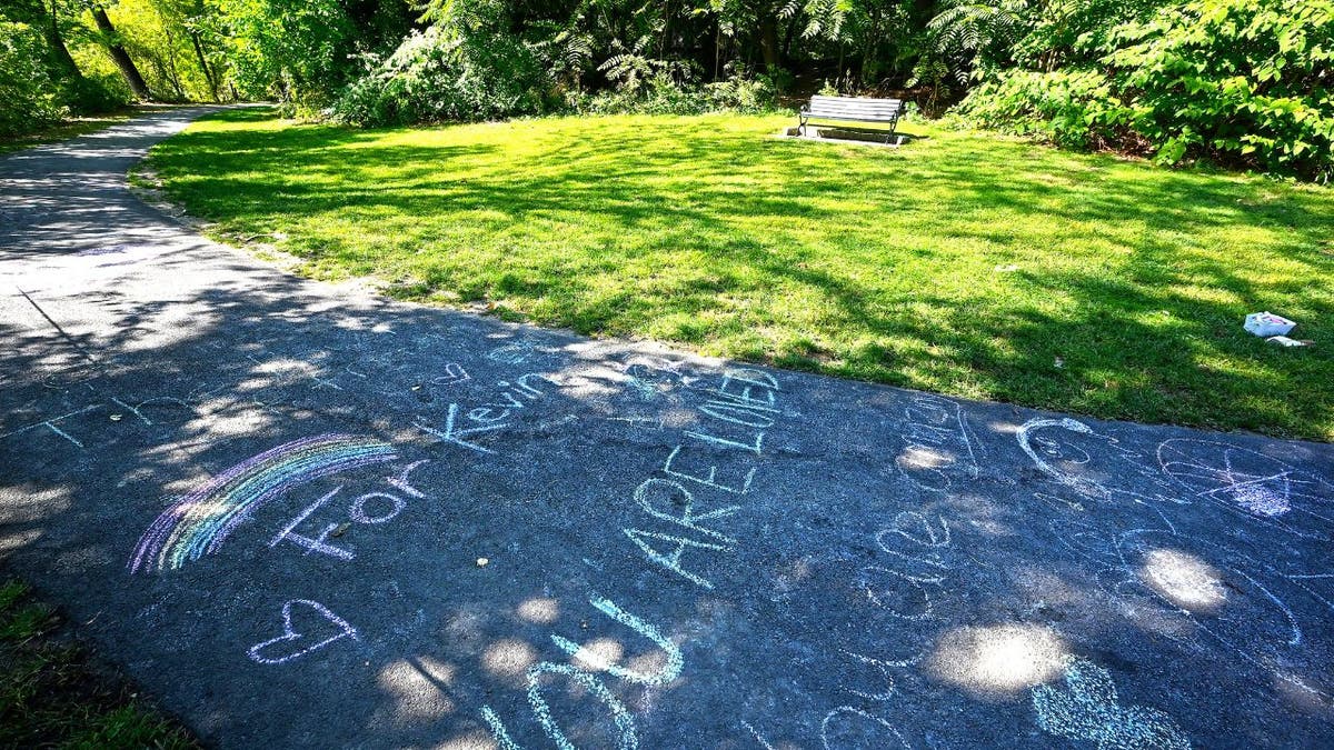 Chalk tributes on walking path near Jordan Pond after Kevin Doherty’s death.