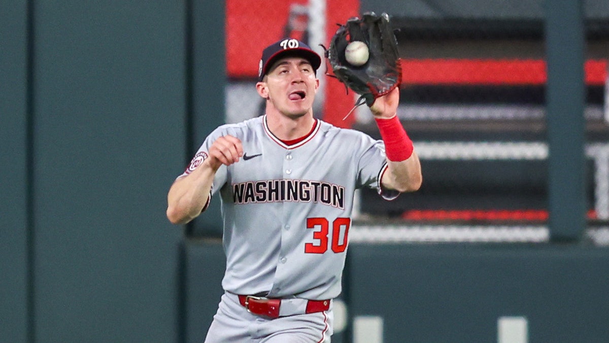 Jacob Young stands for the catch