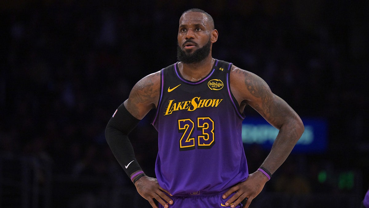 LeBron James with his hands on his hips