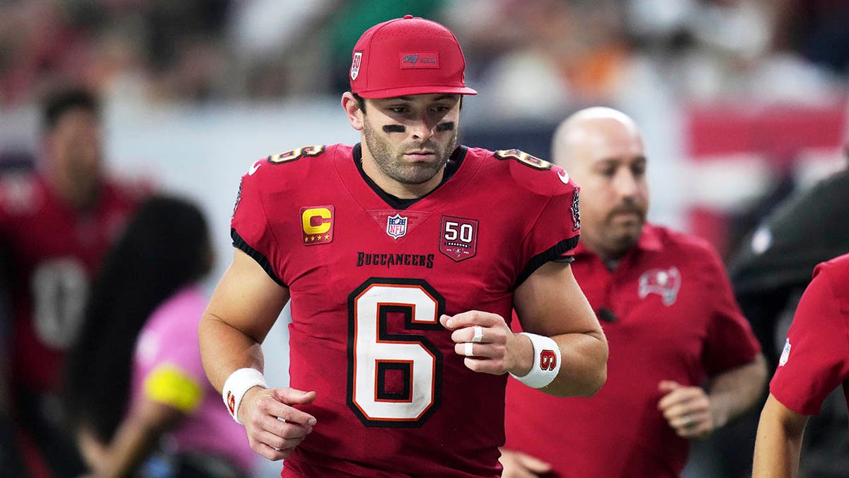 Baker Mayfield runs off the field