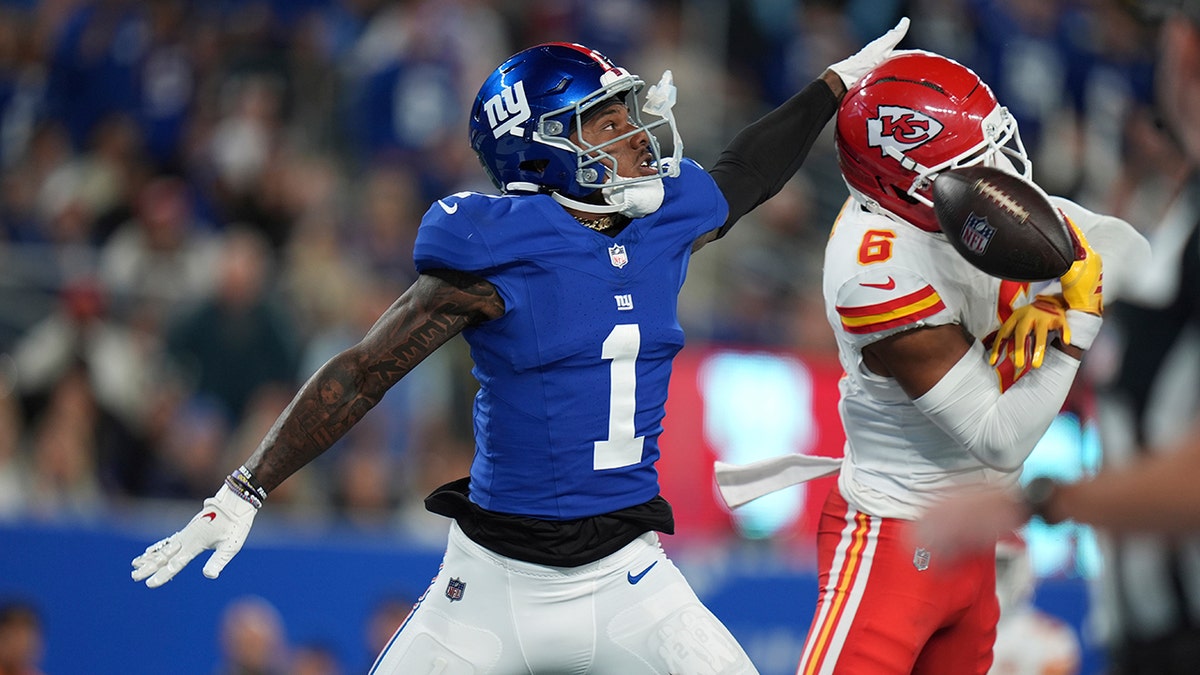 Bryan Cook breaks up a pass