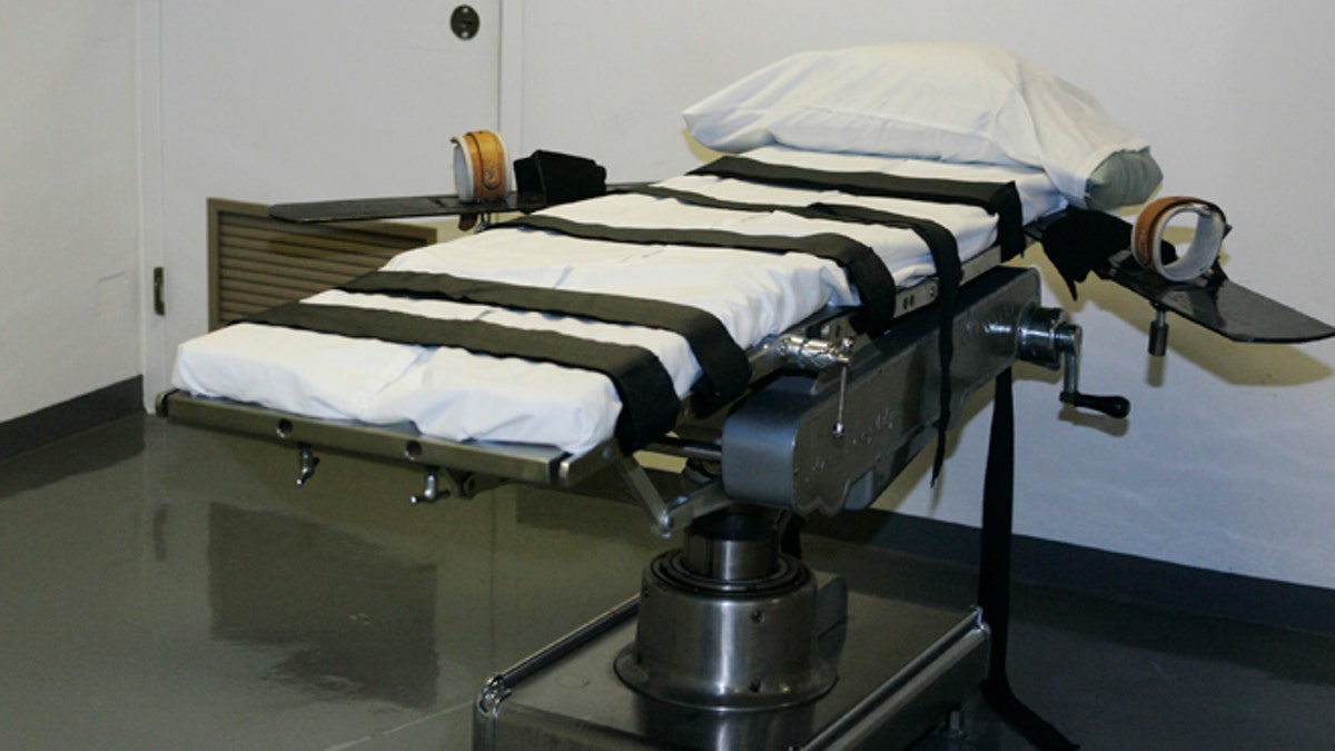 In this April 15, 2008 file photo, the gurney in the execution chamber at the Oklahoma State Penitentiary is pictured in McAlester, Okla. 