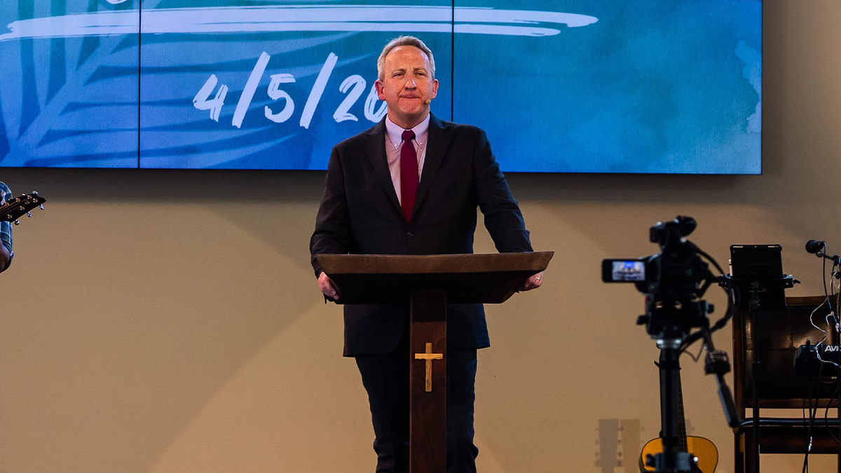Pastor McCory speaks during church service
