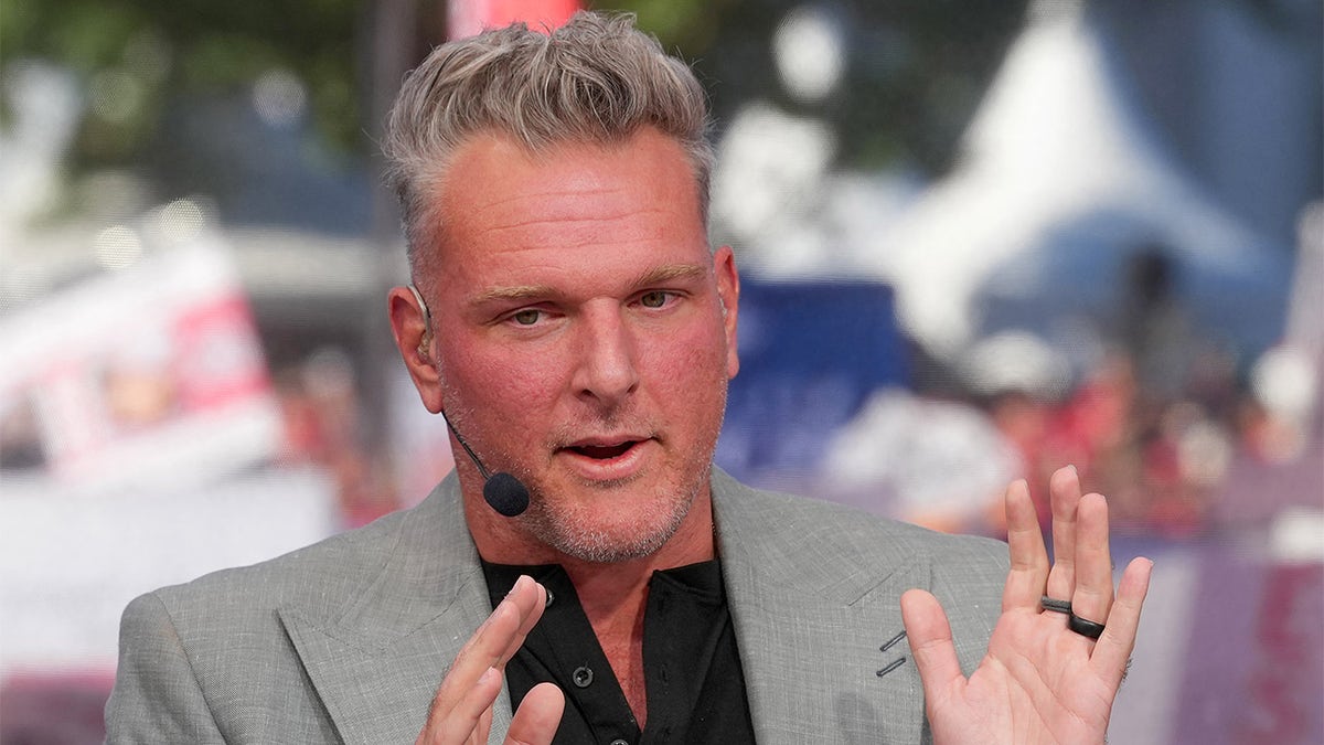 Pat McAfee looks on