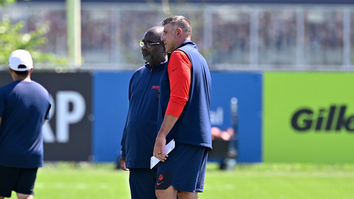 Terrell Williams and Mike Vrabel