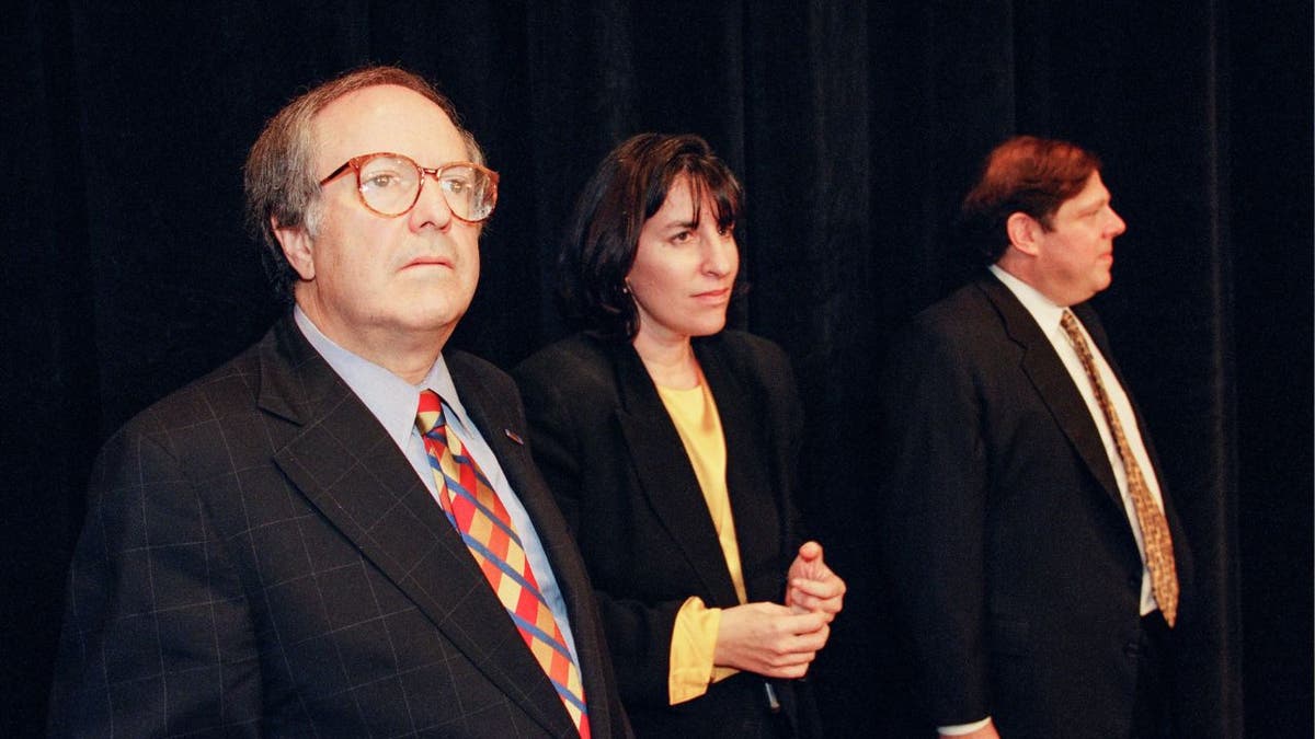 Robert Barnett with Mandy Grunwald and Mark Penn at a Washington event.