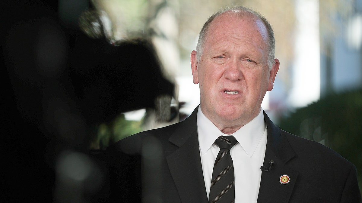 White House "border czar" Tom Homan answers questions during a TV interview outside the White House on Monday about the administration's efforts to continue strong immigrant operations.