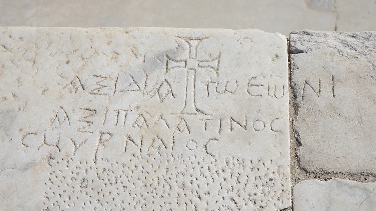 Koine Greek inscription at Laodicea with Christian cross