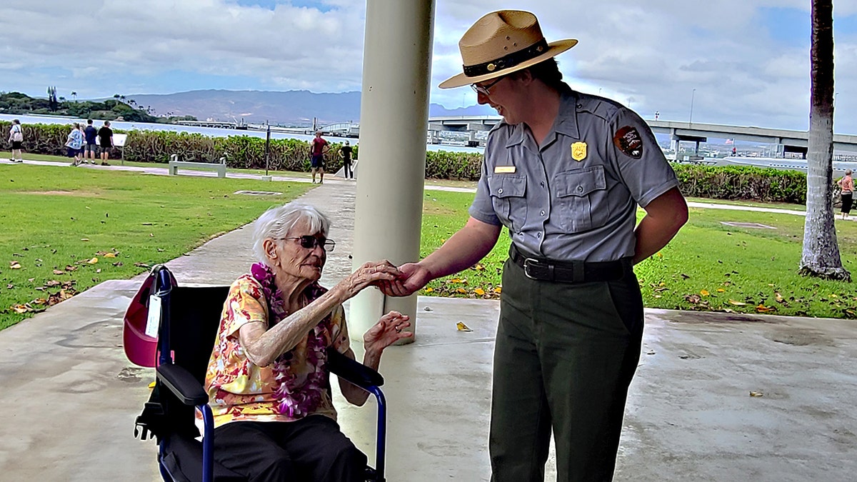 World War II Navy Nurse Alice Beck Darrow with museum official