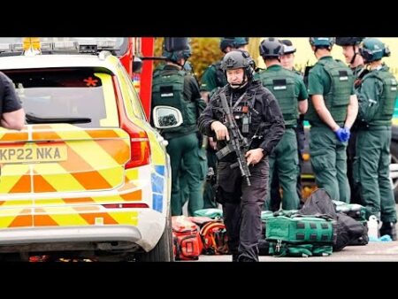 Two killed and three seriously injured in car and knife attack at Manchester synagogue, police say