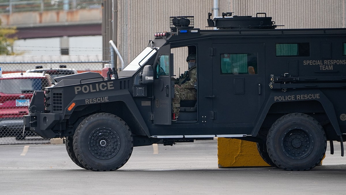 A federal agent sits in a vehicle outside the U.S. Immigration and Customs Enforcement (ICE) building Wednesday, Sept. 24, 2025, in Broadview, Ill. 
