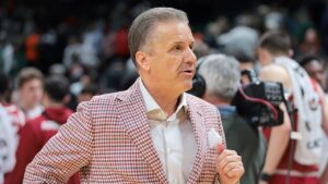 Coach Cal, self-described ‘poor, miserable, sinner,’ left Kentucky for Arkansas after chat with priest