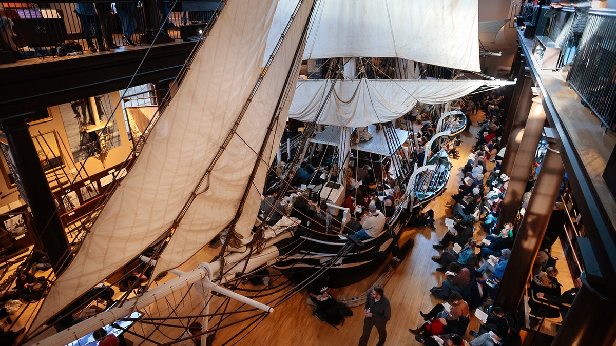 Tourists walking around New Bedford Whaling Museum