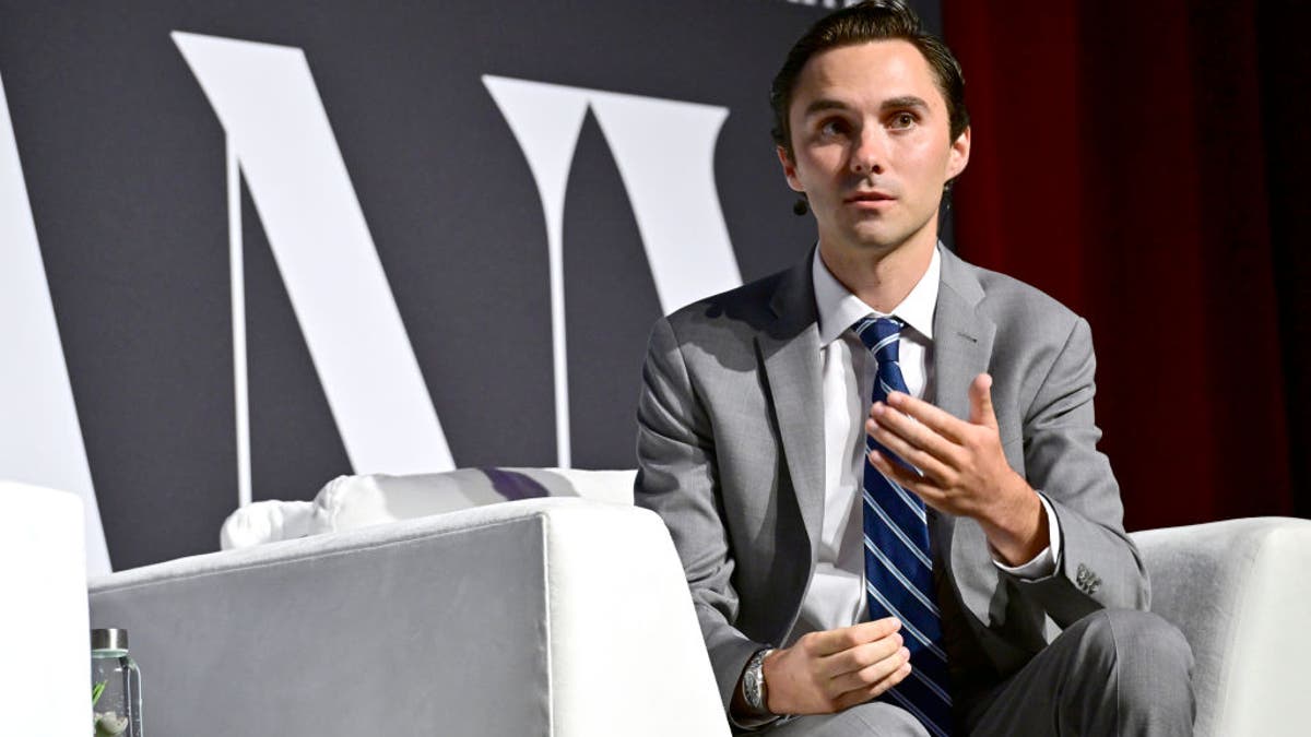 David Hogg, the former DNC vice chair, seen speaking on a panel. 