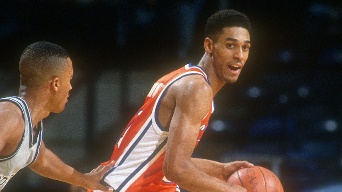 Lawrence Moten dribbles