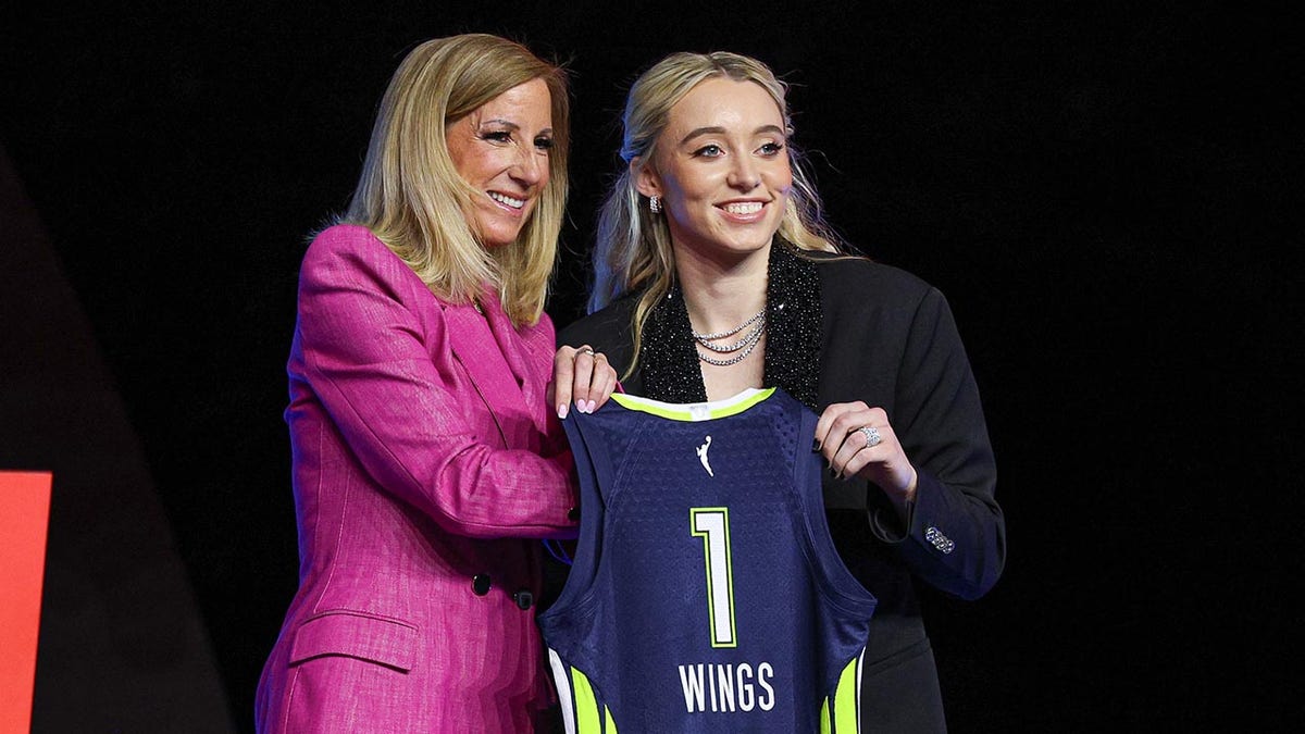 Paige Bueckers with WNBA Commissioner Cathy Engelbert