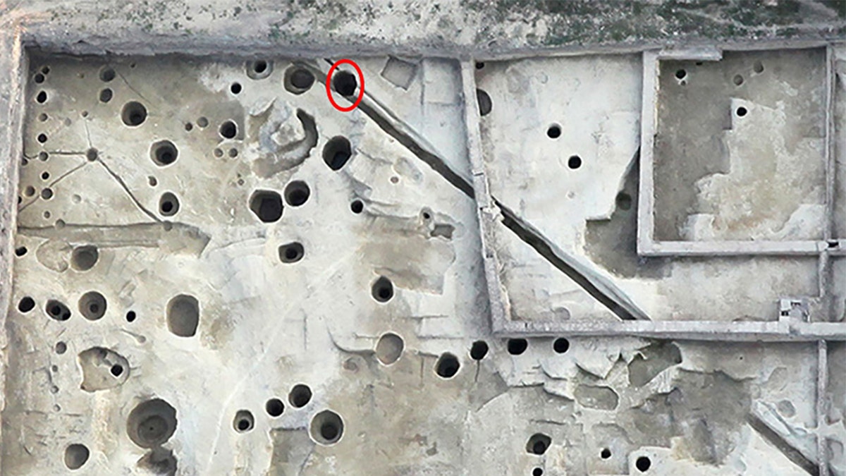 Aerial view of well where skeletons were found
