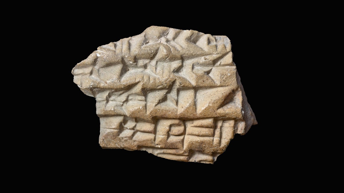 Close-up of Assyrian inscription artifact